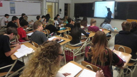 Students listen to Jared Perez explain a lesson in Algebraic Principles class during Block 4 on Aug. 26.