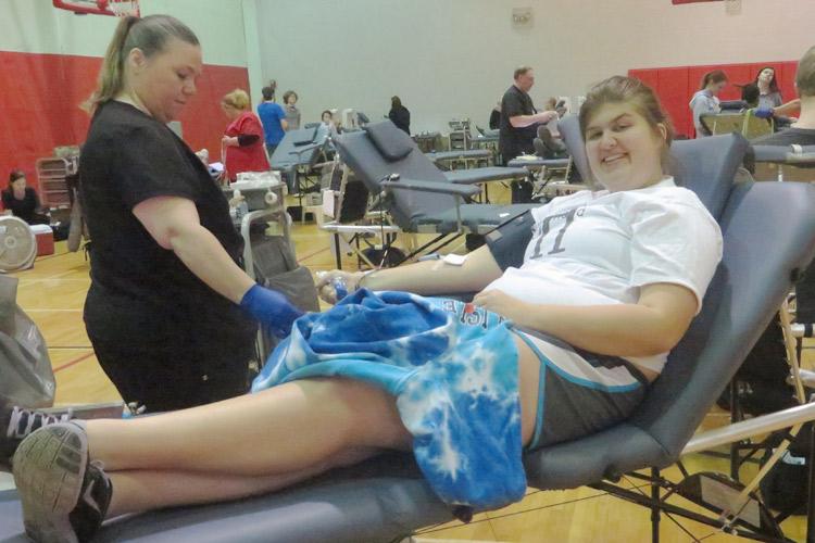 Students give blood in the last blood drive of the year on April 7.