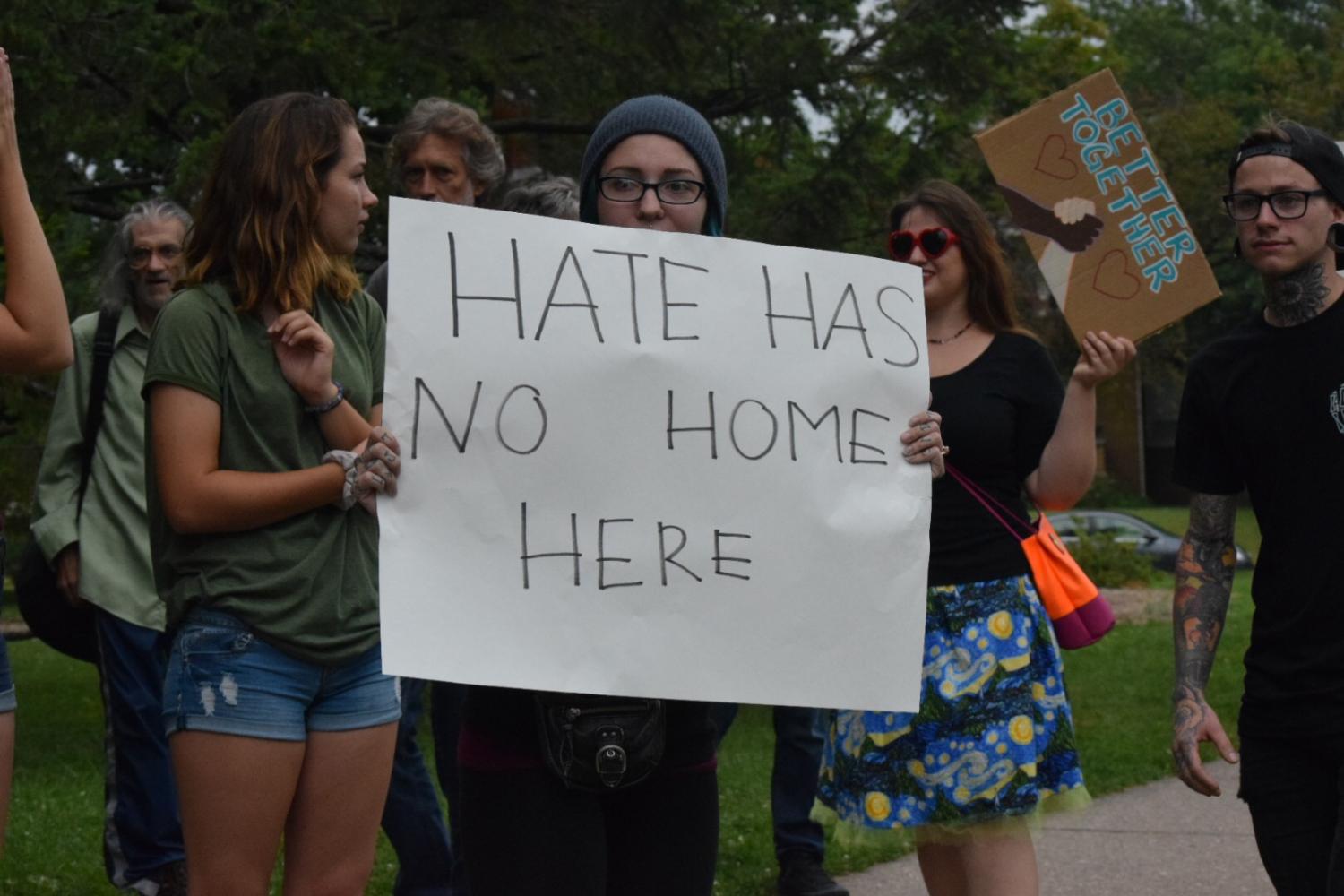Protestors show their opinion on hate speech at the Quad Cities No Hate rally.