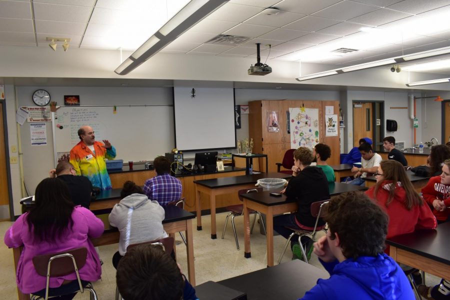 Saint  Ambrose Chemistry professor Andy Axup teaching chemistry teachers John Arnold and Andrea Andrews, third and fourth block about chemistry and how it can be used everyday.