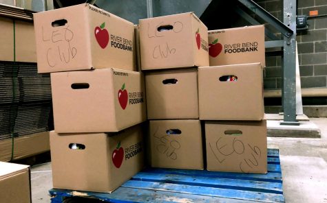 Food that the Leo Club collected sits in the West garage before waiting to be shipped of to the food bank