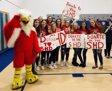 Freddie the Falcon shows his support for the Student Hunger-Drive and those without a meal.