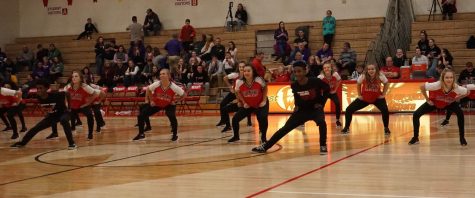 Freshmen Nasir and Nasiah Kolwey dance at the halftime show at the basketball game on Jan. 4th.