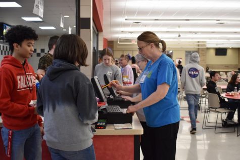 At West during C lunch, students put in their ID or pay for lunch, meanwhile the cafeteria staff help at the registers “Whenever you get food, they are always mostly smiling they're mostly happy and we rarely ever see them sad,” junior Makayla Brown said.