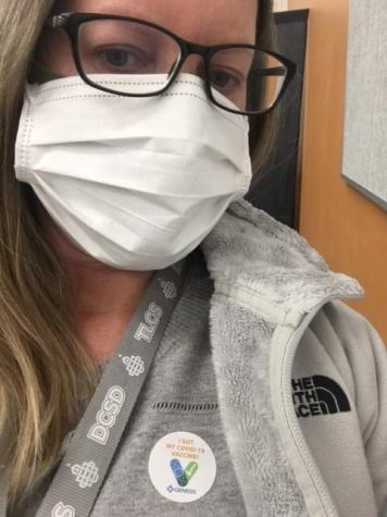 Myriam Stangherlin poses with her “I got my COVID-19 Vaccine” sticker. Originally from Italy, Stangherlin was ecstatic to receive the Moderna vaccine. “Despite my experience, I am very grateful to be given the opportunity to get vaccinated,” Stangherlin said. 
