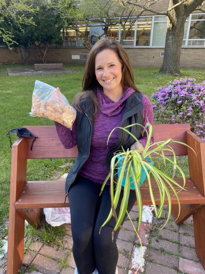 Spanish teacher Stephanie Hansen proudly holds her go-to meal of chicken nuggets along with her favorite plant. Hansen explained how she ironically had the chicken nuggets at school as she was sharing with those around her. Not surprising, her care for others is always showing.
