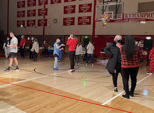 Music was playing over the speakers so that attendees could dance. Of course, there were other activities available, such as cornhole. 