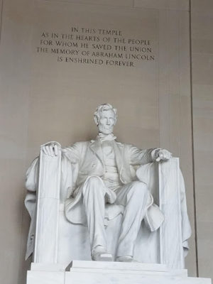 The statue of President Lincoln that the West High Band is going to perform in honour of. The Lincoln Memorial was built 100 years ago and opened 30 May, 1922.
