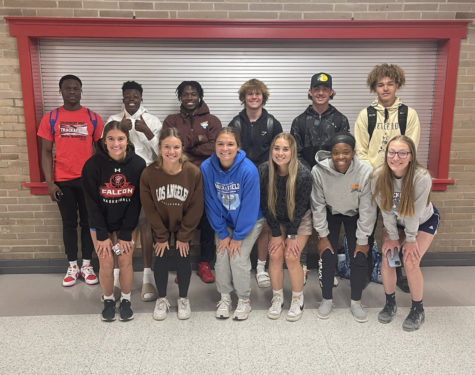 Several of West’s track state qualifiers pose for a picture.