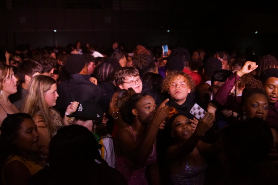 The dance floor of West’s homecoming. The students were enjoying themselves by dancing, singing, and filming.
