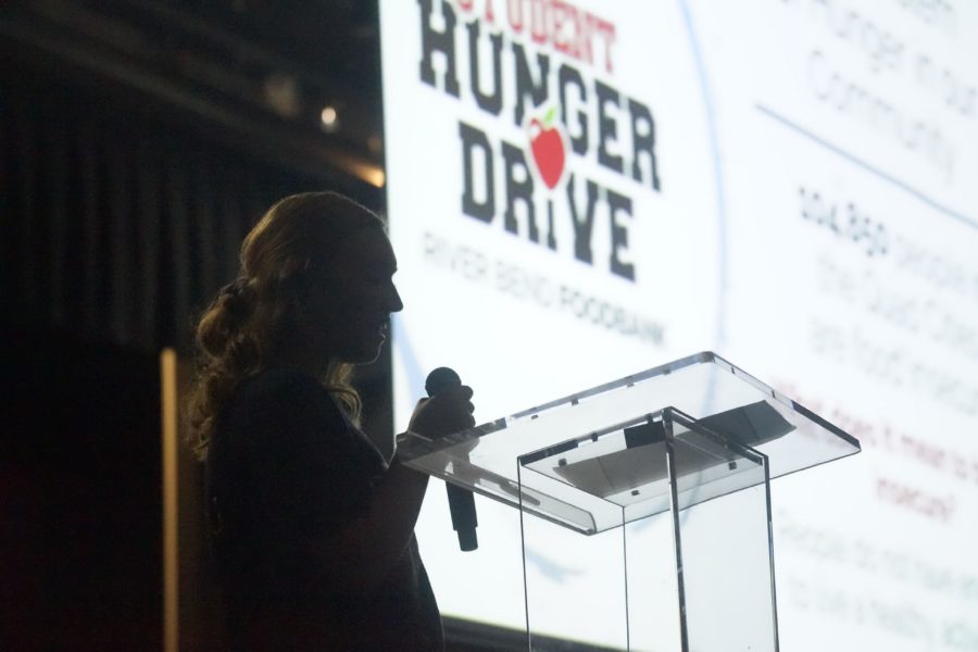 Karlee Krenz ‘23 informs students about the Hunger Drive and why it’s important to donate. Students were interested in the Hunger Drive events they could participate in. 
