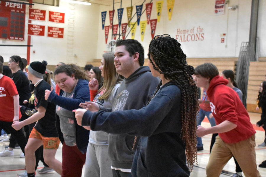 Falcon Friends join up with the West Connection Show Choir to learn a dance. 