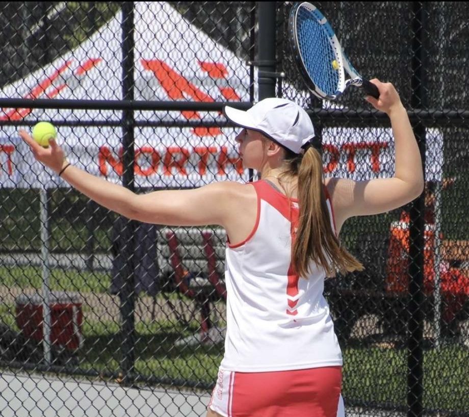 Senior Ellie Holdorf plays tennis at the MAC tournament, which is one of the three sports she participates in.