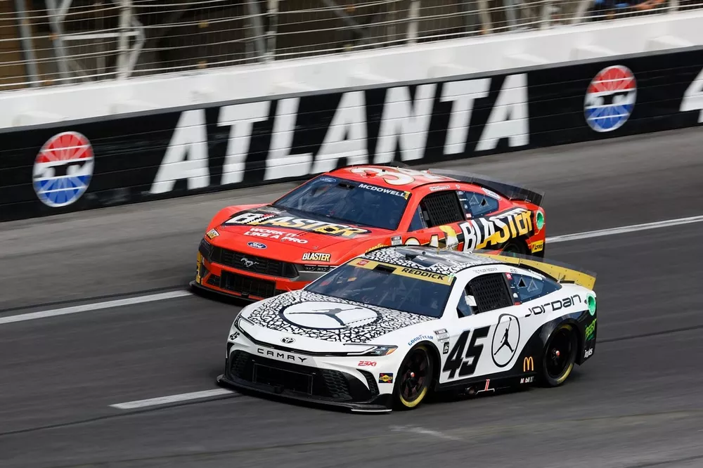 Tyler Reddick (#45) of 23XI Racing and Michael McDowell (#34) of Front Row Motorsports race during a NASCAR Cup Race at Atlanta Motor Speedway on Sunday, Sep. 8, 2024. 23XI Racing and Front Row Motorsports are the two teams challenging NASCAR in this antitrust lawsuit.